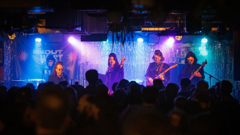 A band performing to a crowd